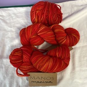 Manos Maxima yarn. 2 full skeins plus 42g leftover ball
